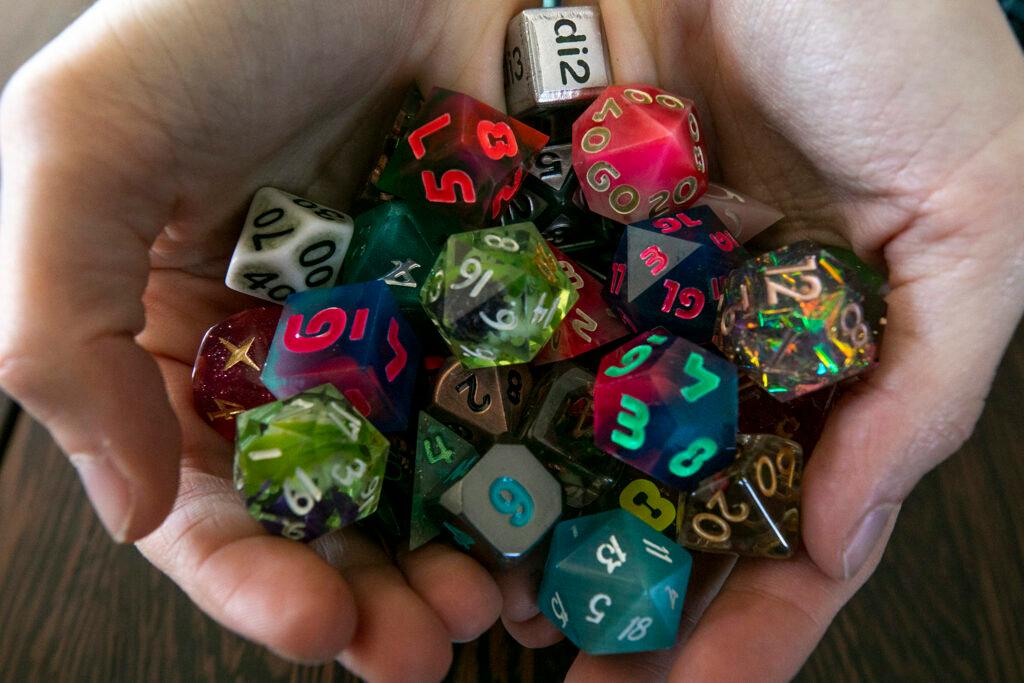 Ginny Di's Denver home is filled with gaming dice. May 3, 2023.