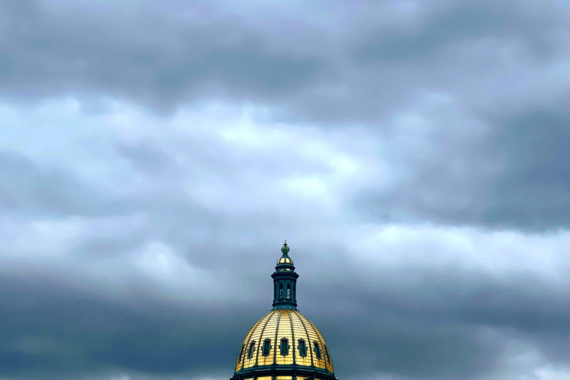 capitol dome Colorado stormy sky clouds