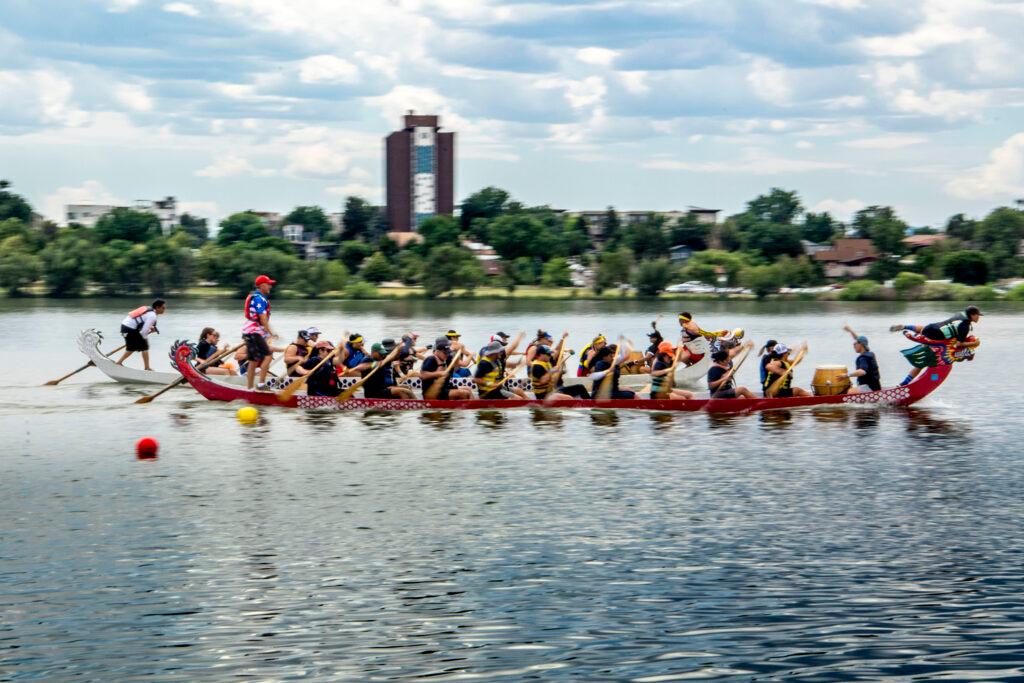 Paddlers race during the Colorado Dragon Boat Festival on July 23, 2022.