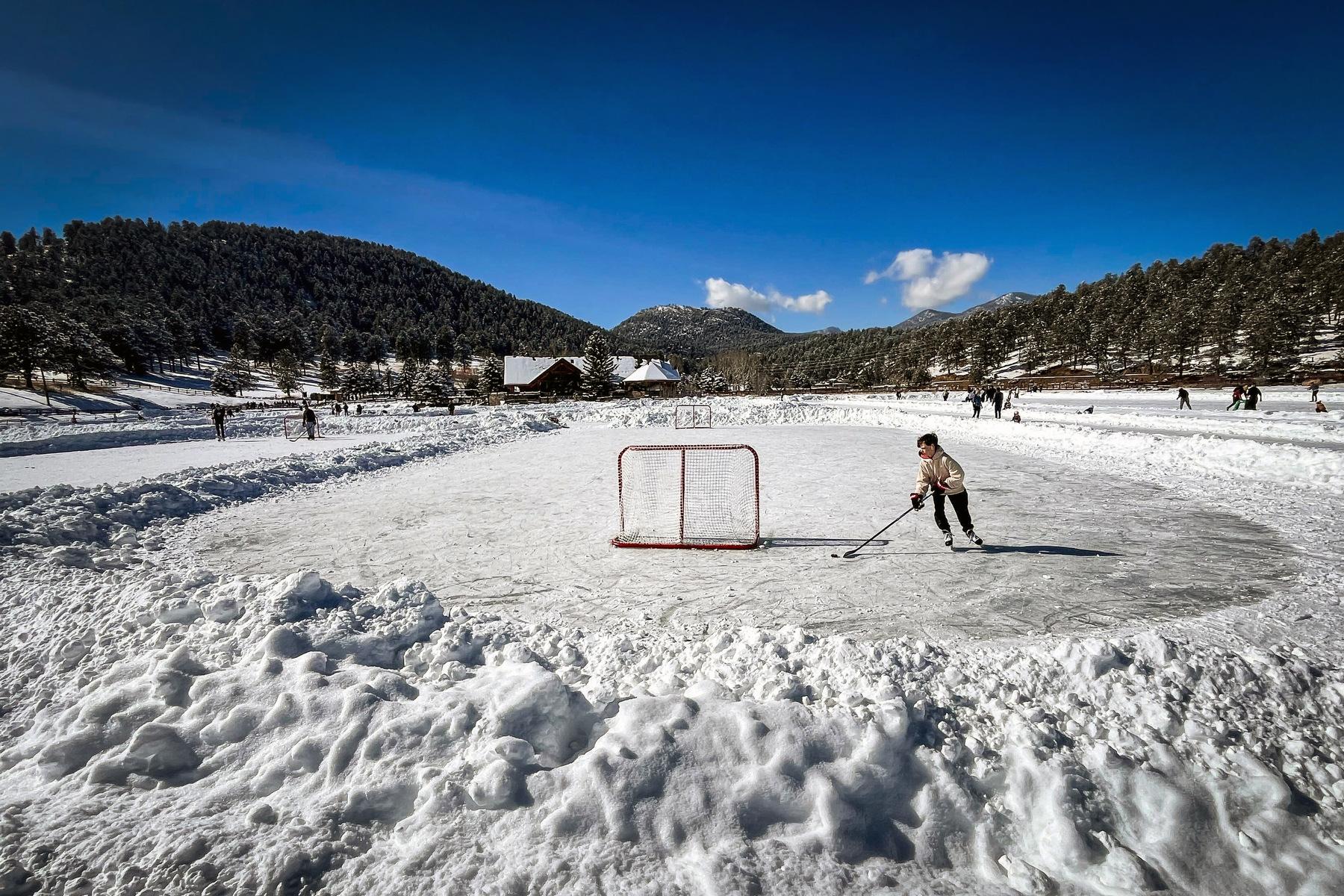 WINTER-SNOW-EVERGREEN-LAKE-ICE-SKATING-240211