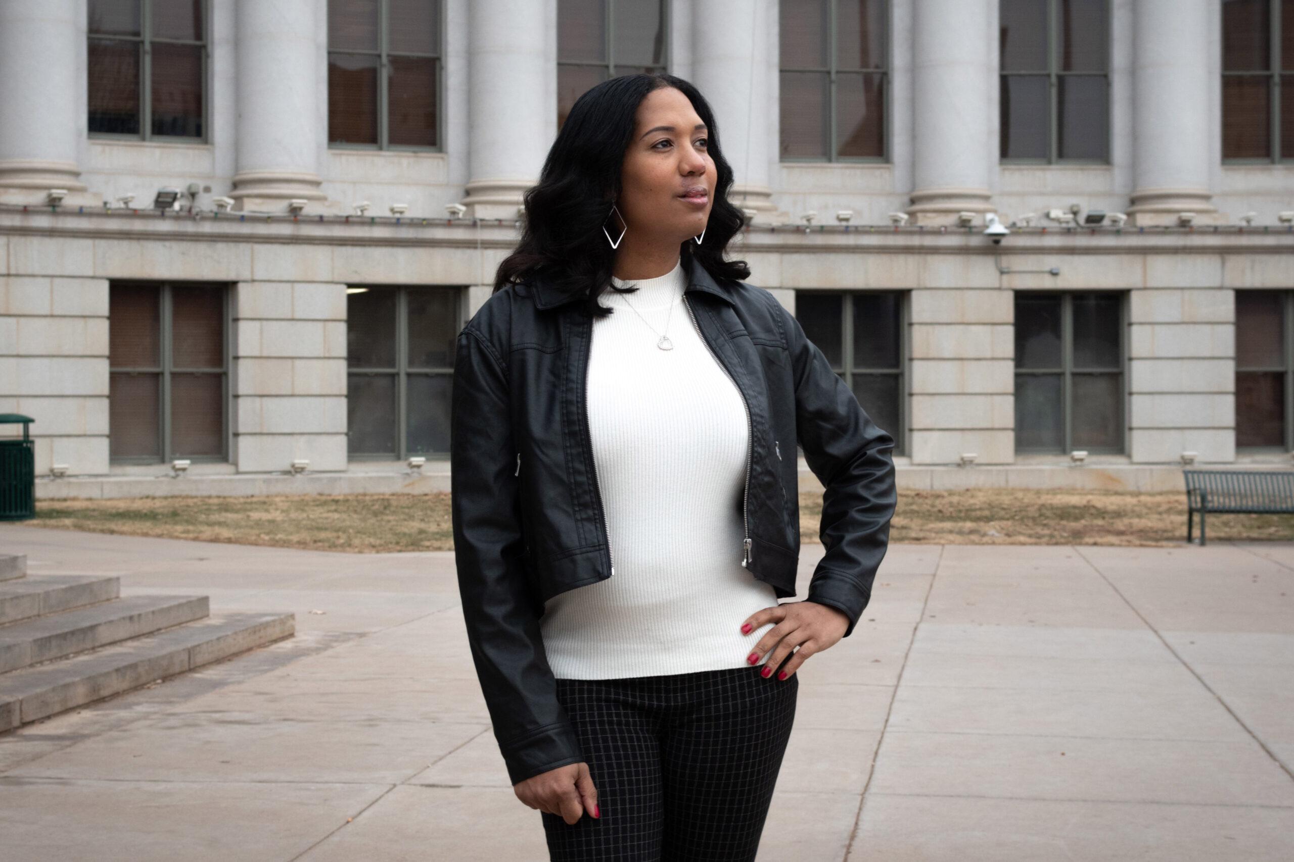 Taliyah Murphy poses for a portrait outside the Denver City and County Building before a hearing on Jan. 4, 2023.