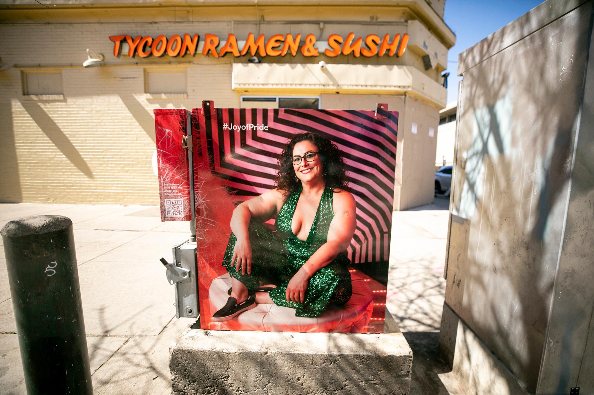 An image of Sheena Kadi on a Colfax Avenue electric box. March 19, 2024.