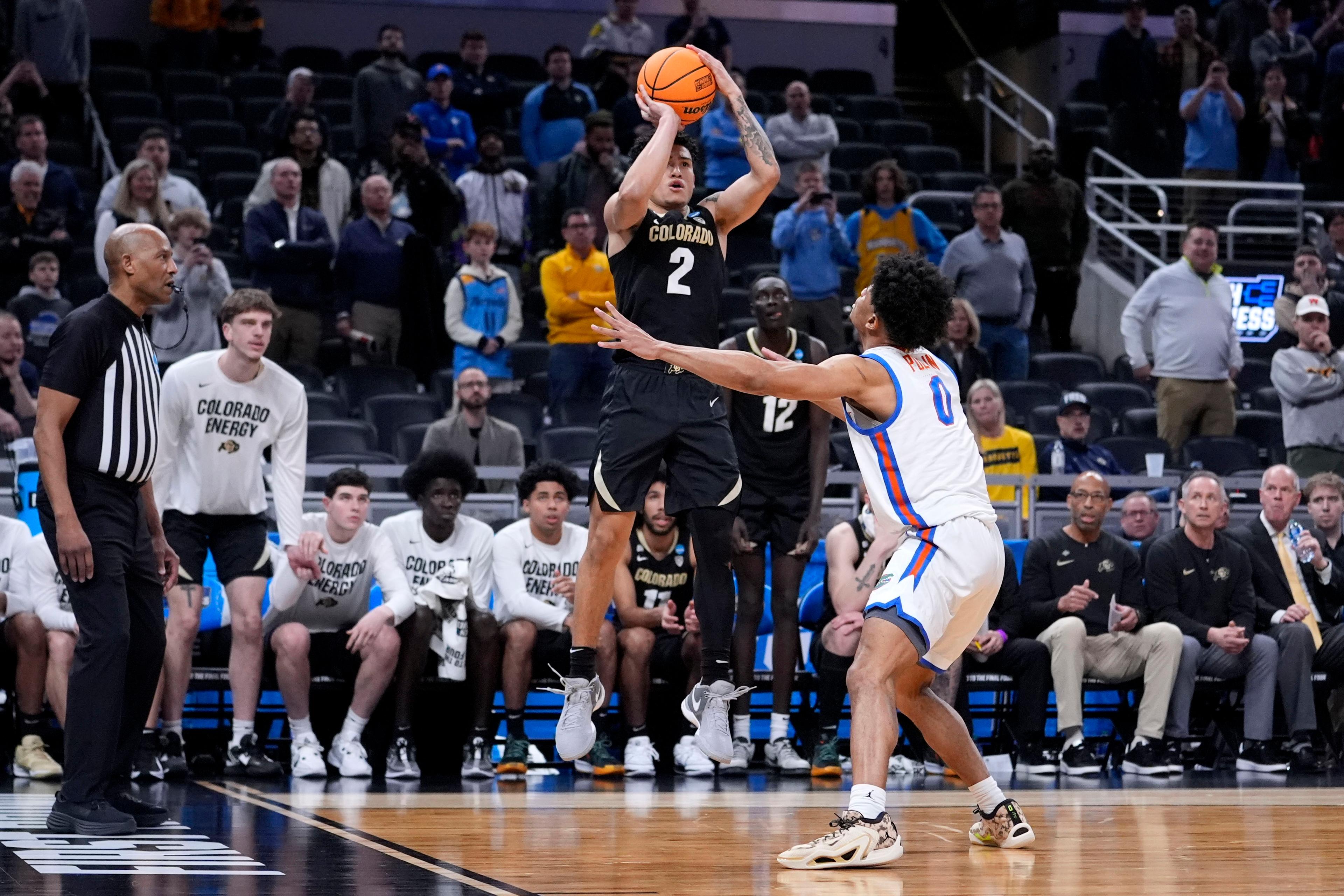 Colorado guard KJ Simpson (2) shoots over Florida guard Zyon Pullin