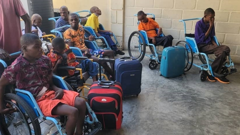 Residents of the HaitiChildren orphanage wait during their evacuation to Jamaica in March, 2024.