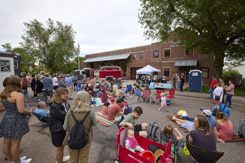 Street vendors and people gathered for the Louisville Fire Station Block Party.