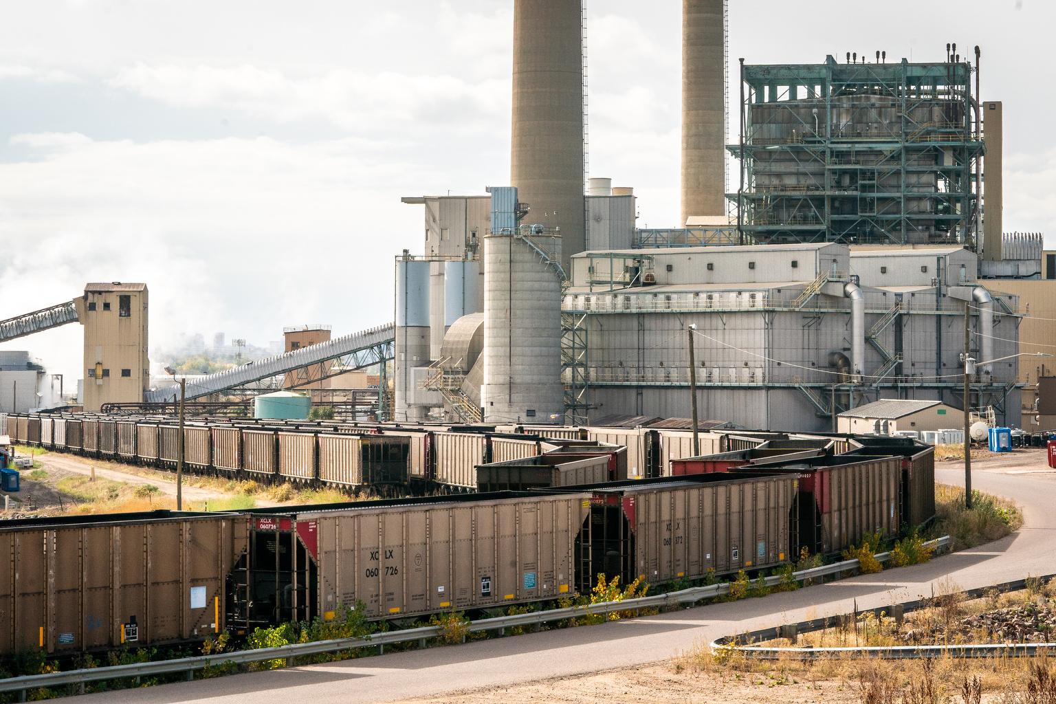 Freight trains at Xcel Energy’s coal-powered Cherokee Generating Station
