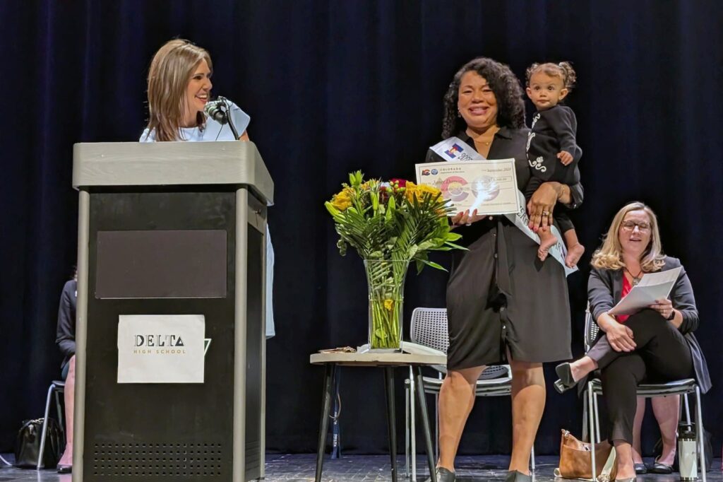 History teacher Janet Damon accepts the Colorado Teacher of the Year award
