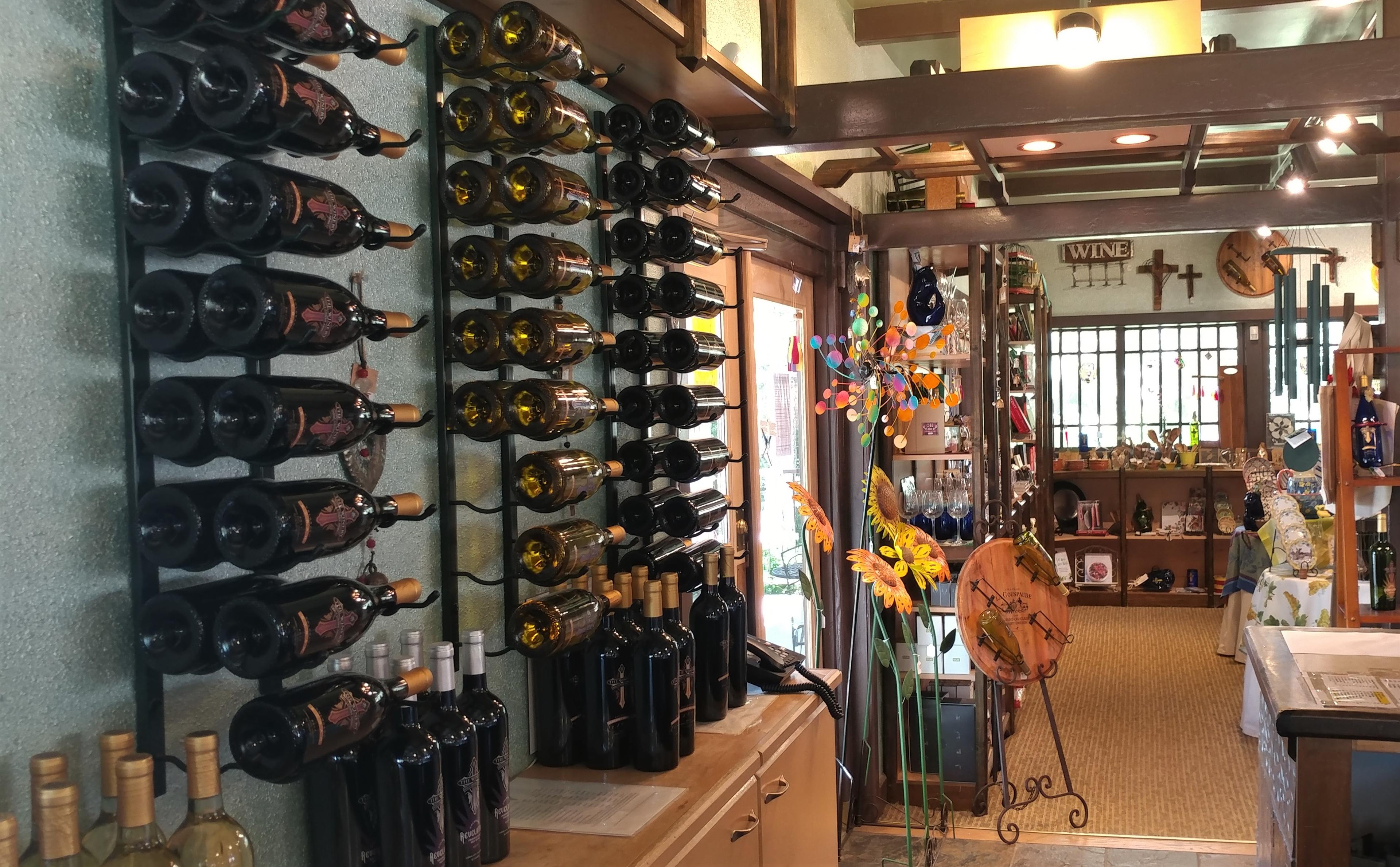 wine bottles in wall racks and gift items