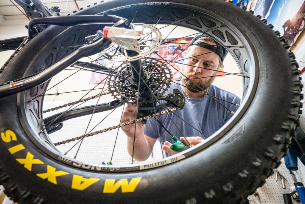 Dakota Mossbrook assembles a Borealis fat bike in the company’s shop in Colorado Springs