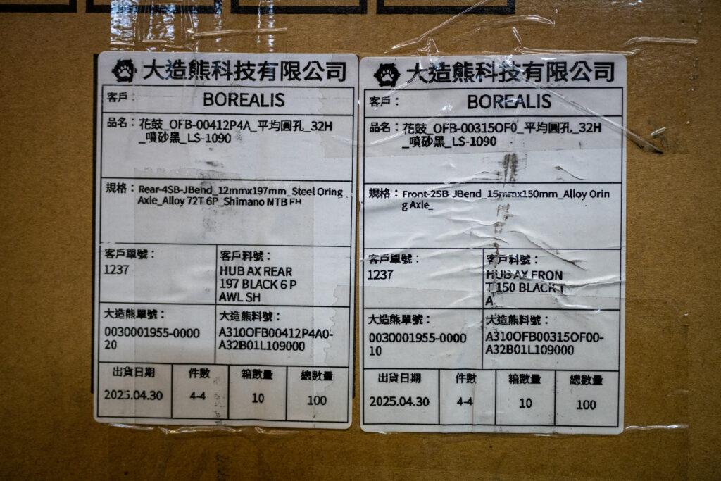 Boxes of bike components shipped from China and Taiwan are stacked high at Borealis in Colorado Springs