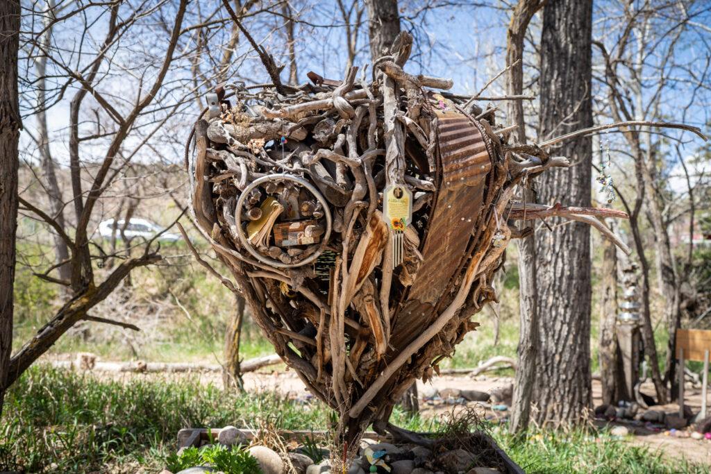 A heart-shaped piece of art created out of flood debris