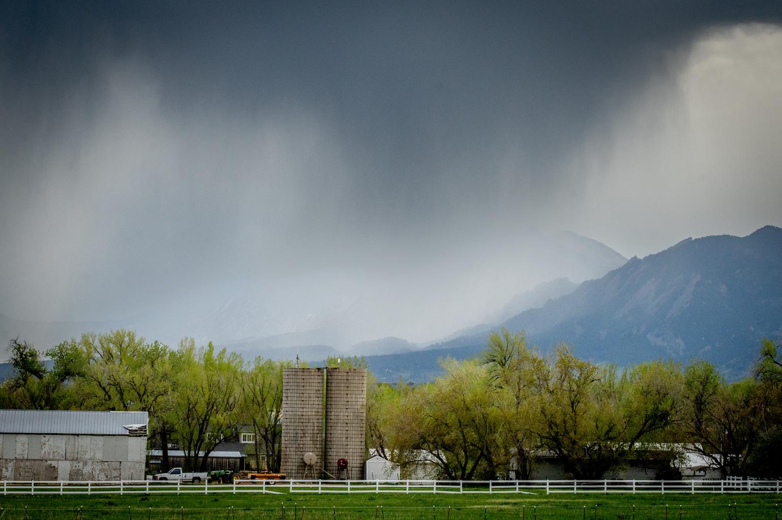 Spring rain falls over Boulder County