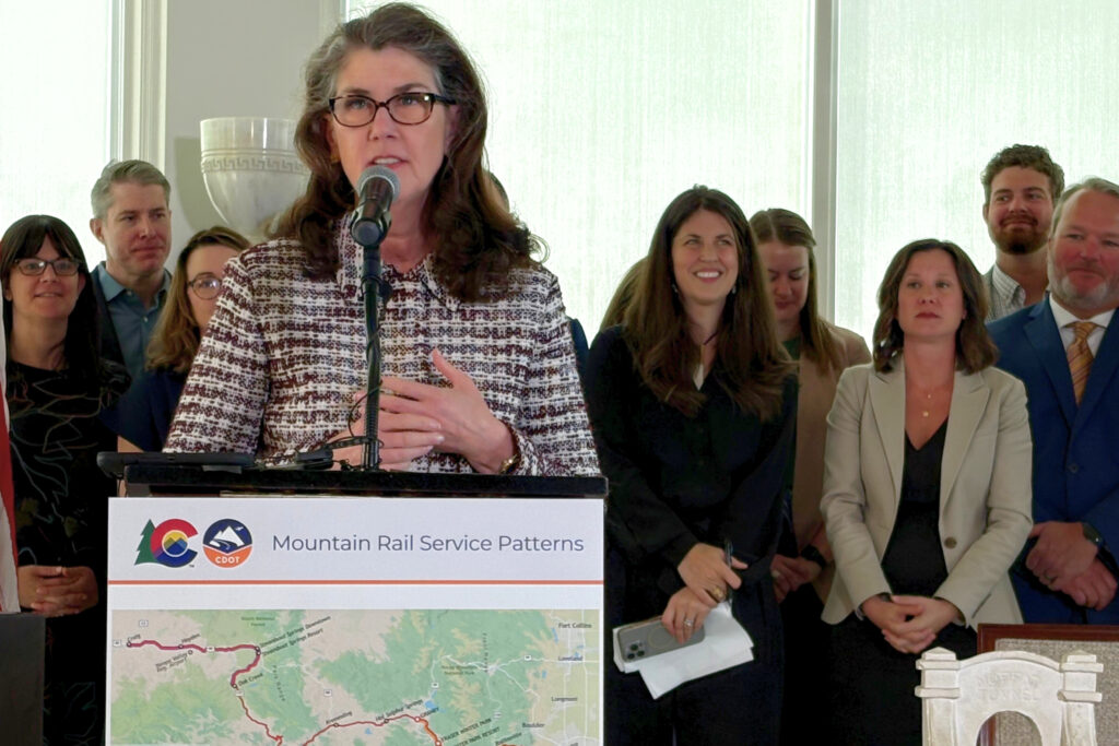 woman speaking into microphone