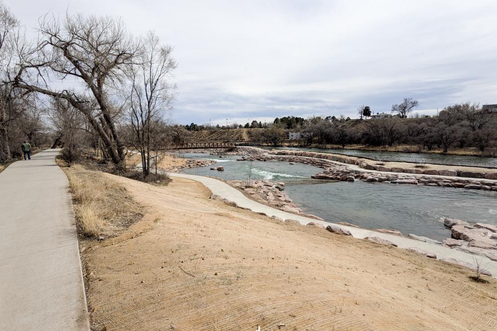 paths line a river bank