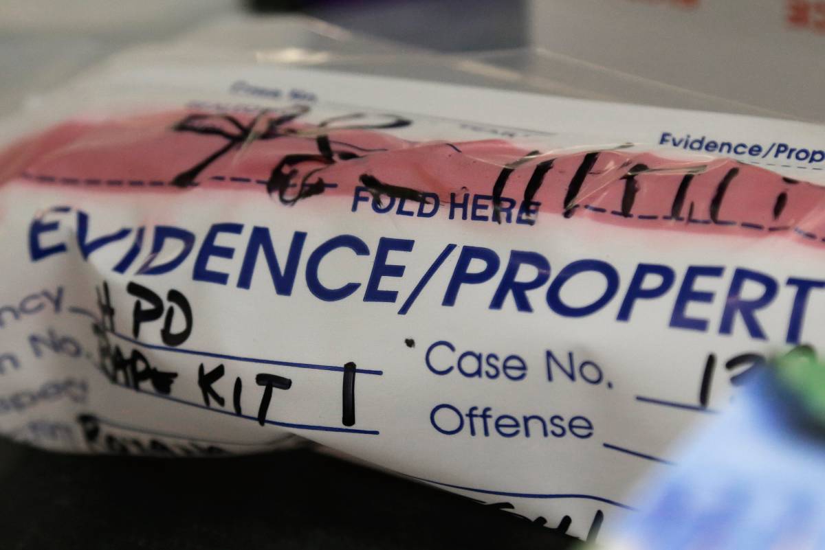 A plastic bag labeled "EVIDENCE/PROPERTY: Rape Kit 1"