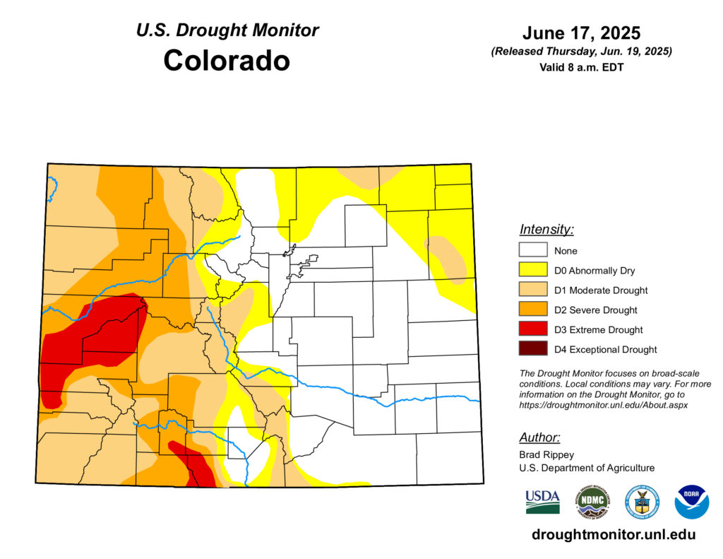 A county map of Colorado with a overlay that shows the varying levels of drought in the state. To the west the colors are orange and red which represents a moderate to severe drought. To the east there is yellow to white, to indicate dry or non-drought weather.