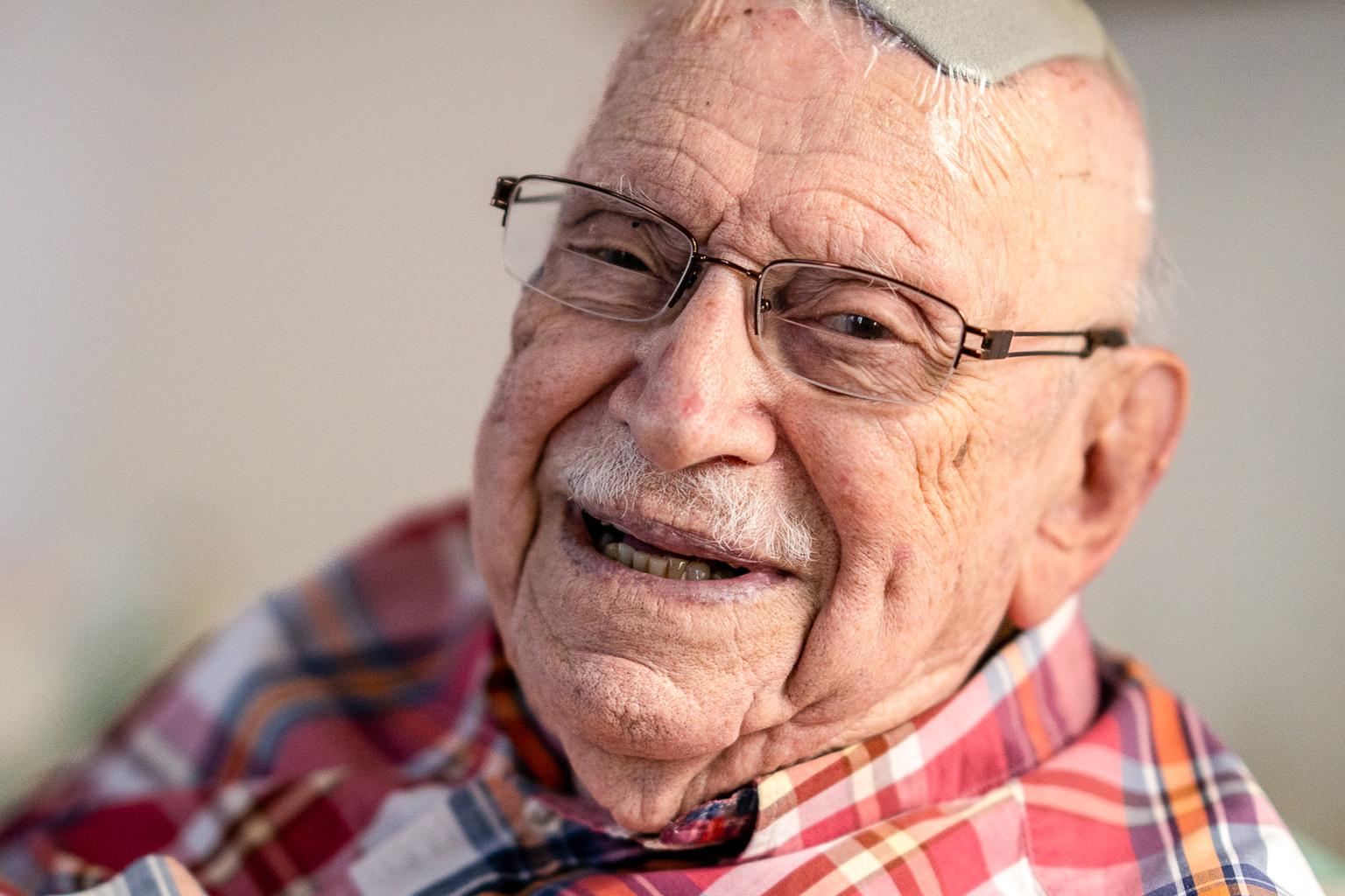 HOWARD BERGER AT HIS HOME IN DENVER