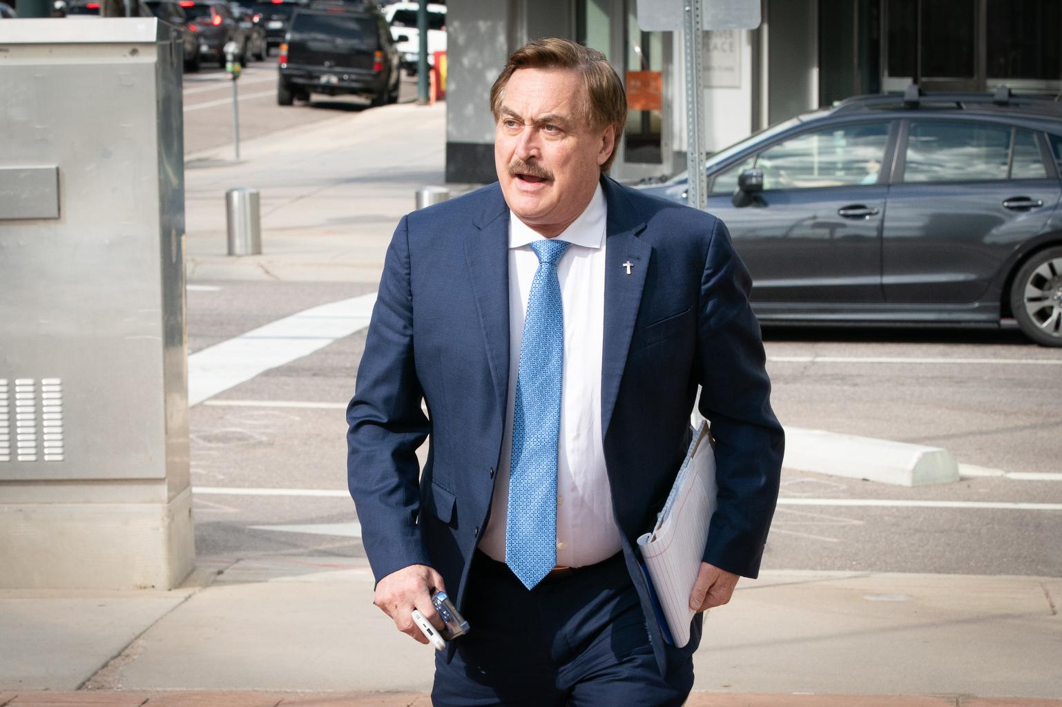 MyPillow founder Mike Lindell walks to federal court on Wednesday, June 11, 2025, in Denver