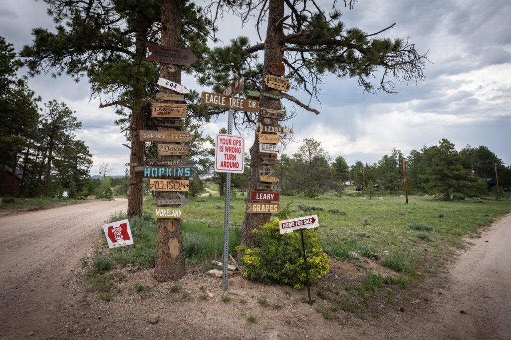 Red Feather Lakes signs on trees