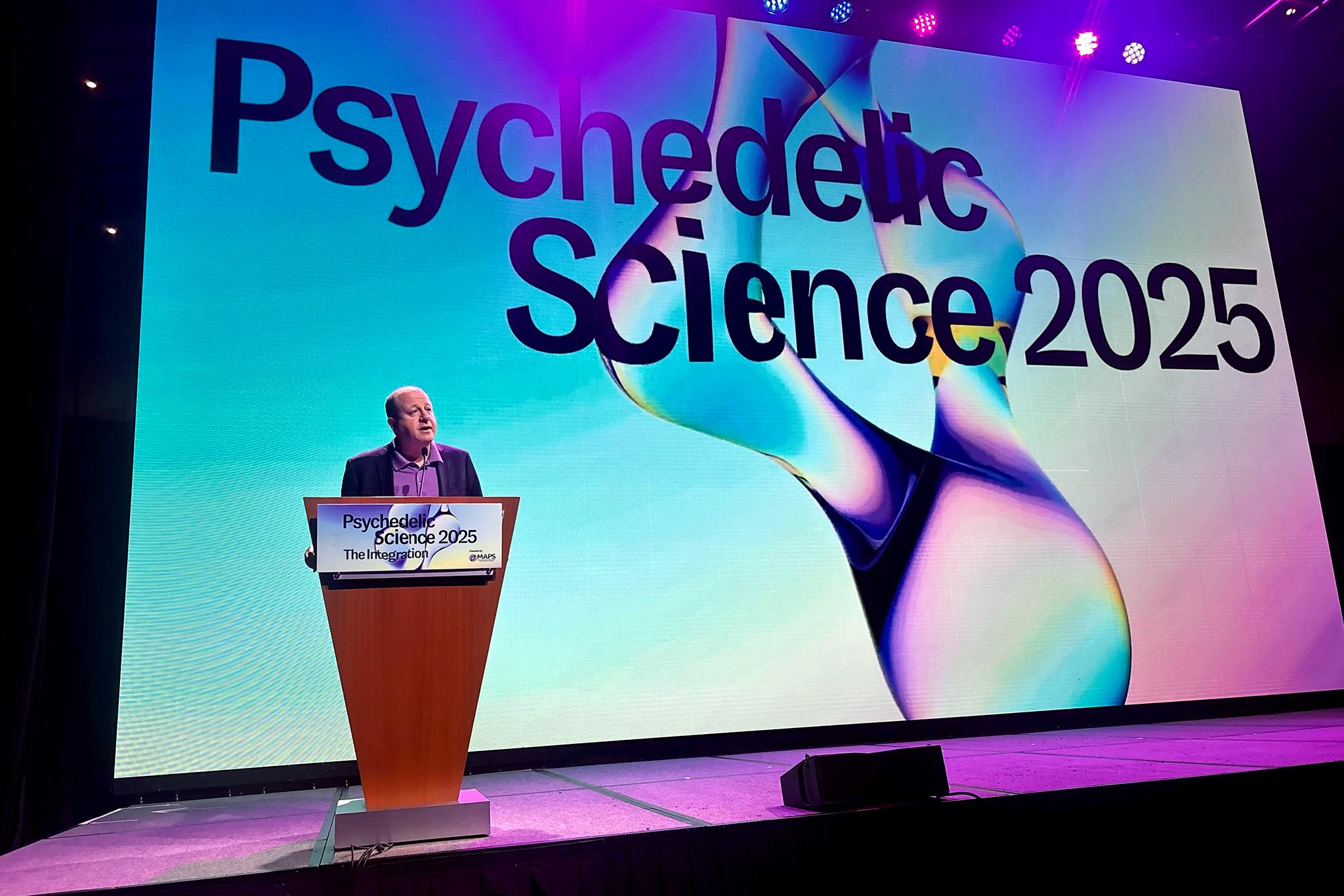 Gov. Jared Polis speaks a the 2025 Psychedelic Science Conference