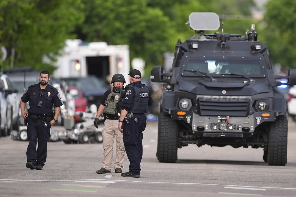 Law enforcement officials investigate after an attack