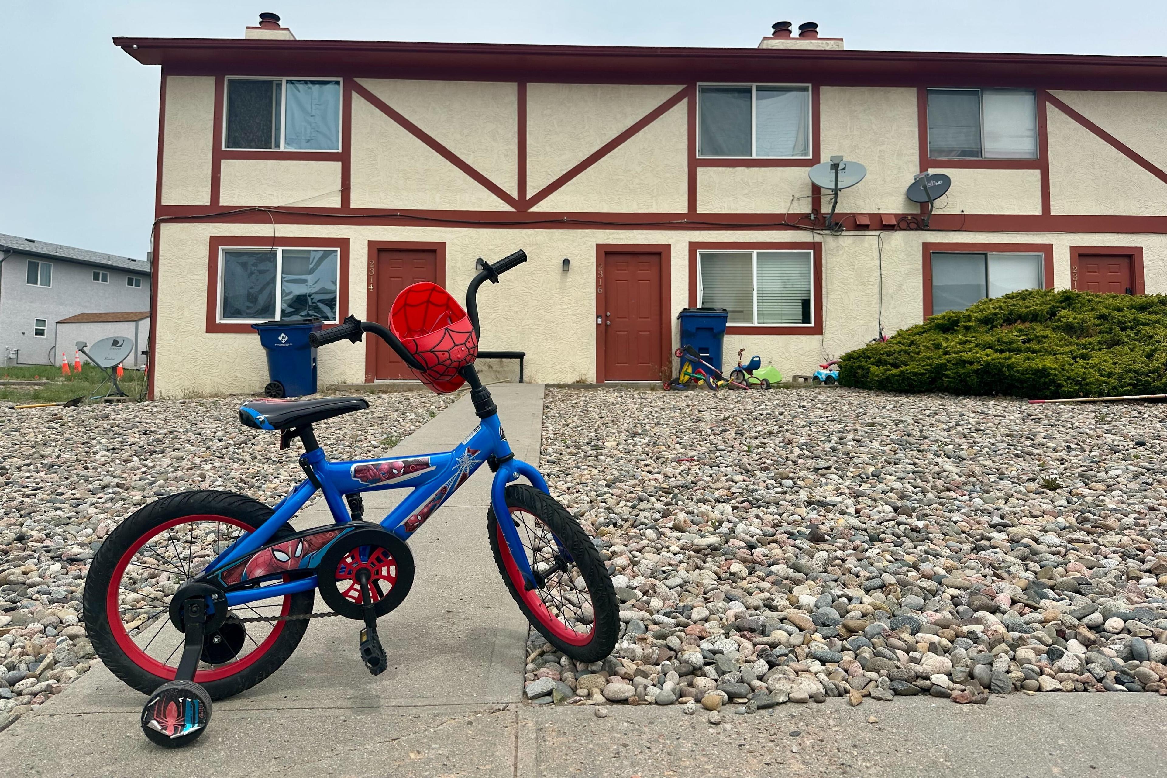 A bicycle in front of a home