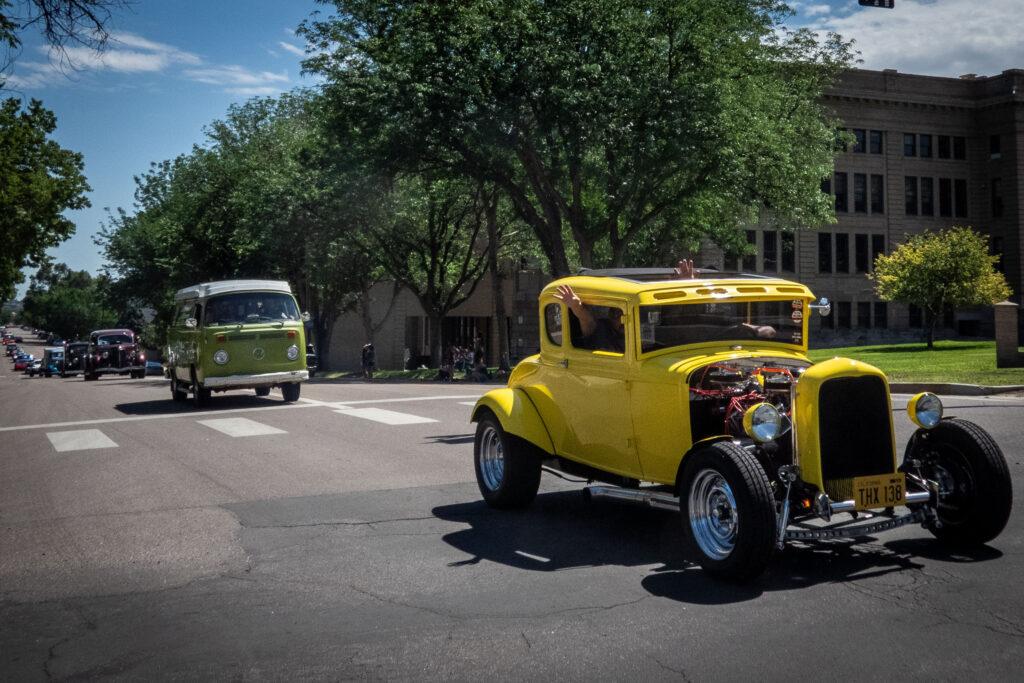 custom vehicles in a parade