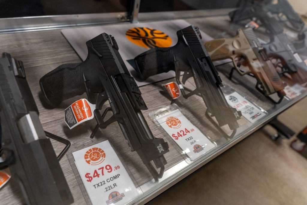 Display case with guns