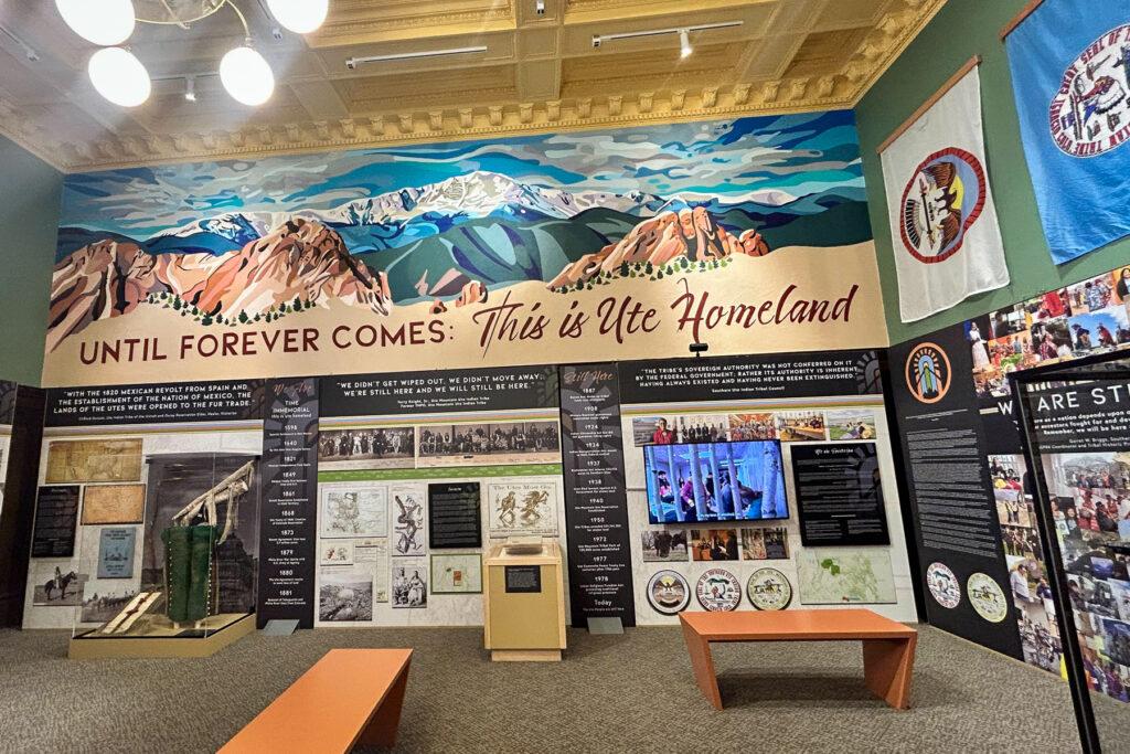 Photo shows an exhibit with three display areas at the Pioneers Museum in Colorado Springs elevating Ute culture and history.