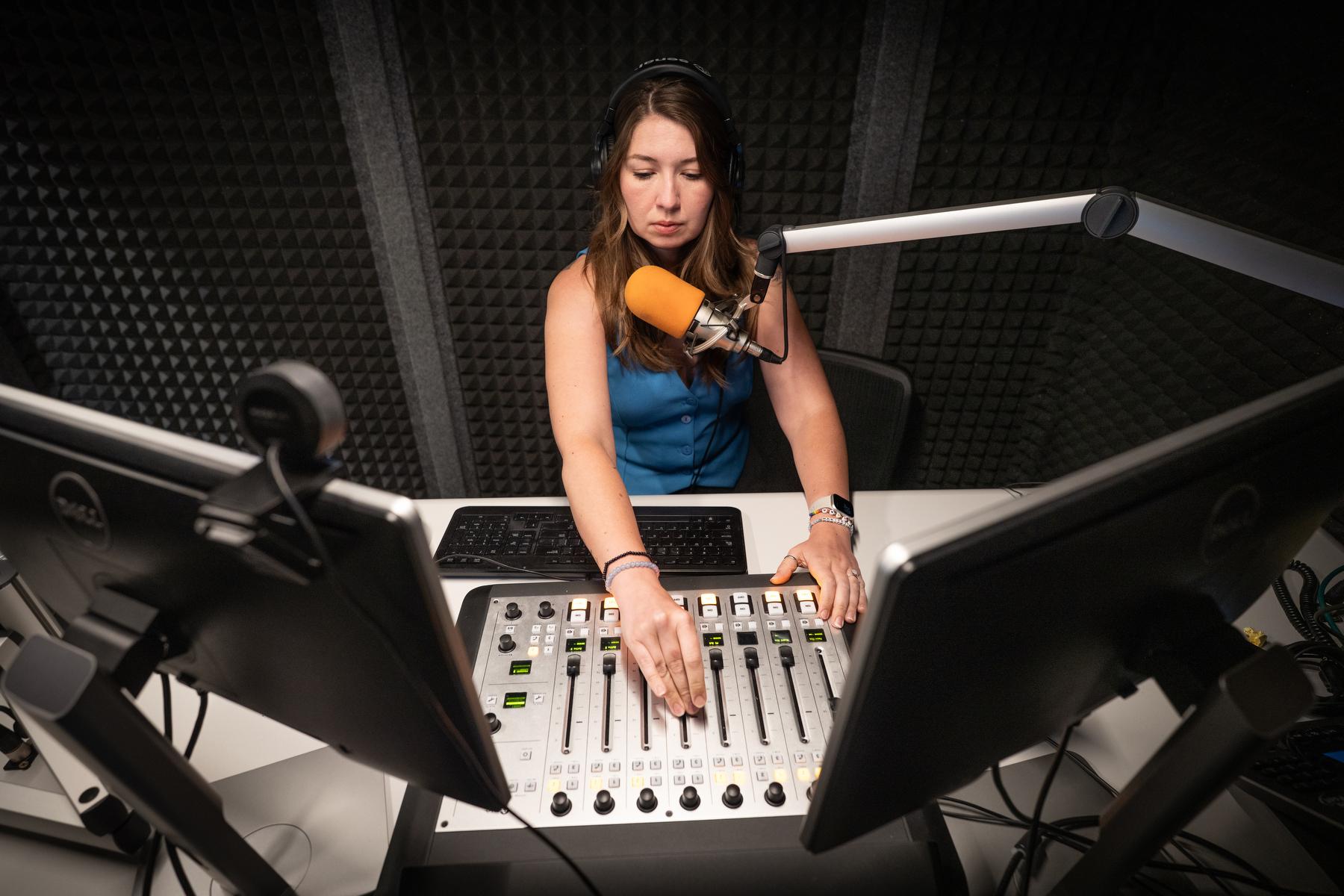 Reporter and host Haylee May in a CPR News recording studio