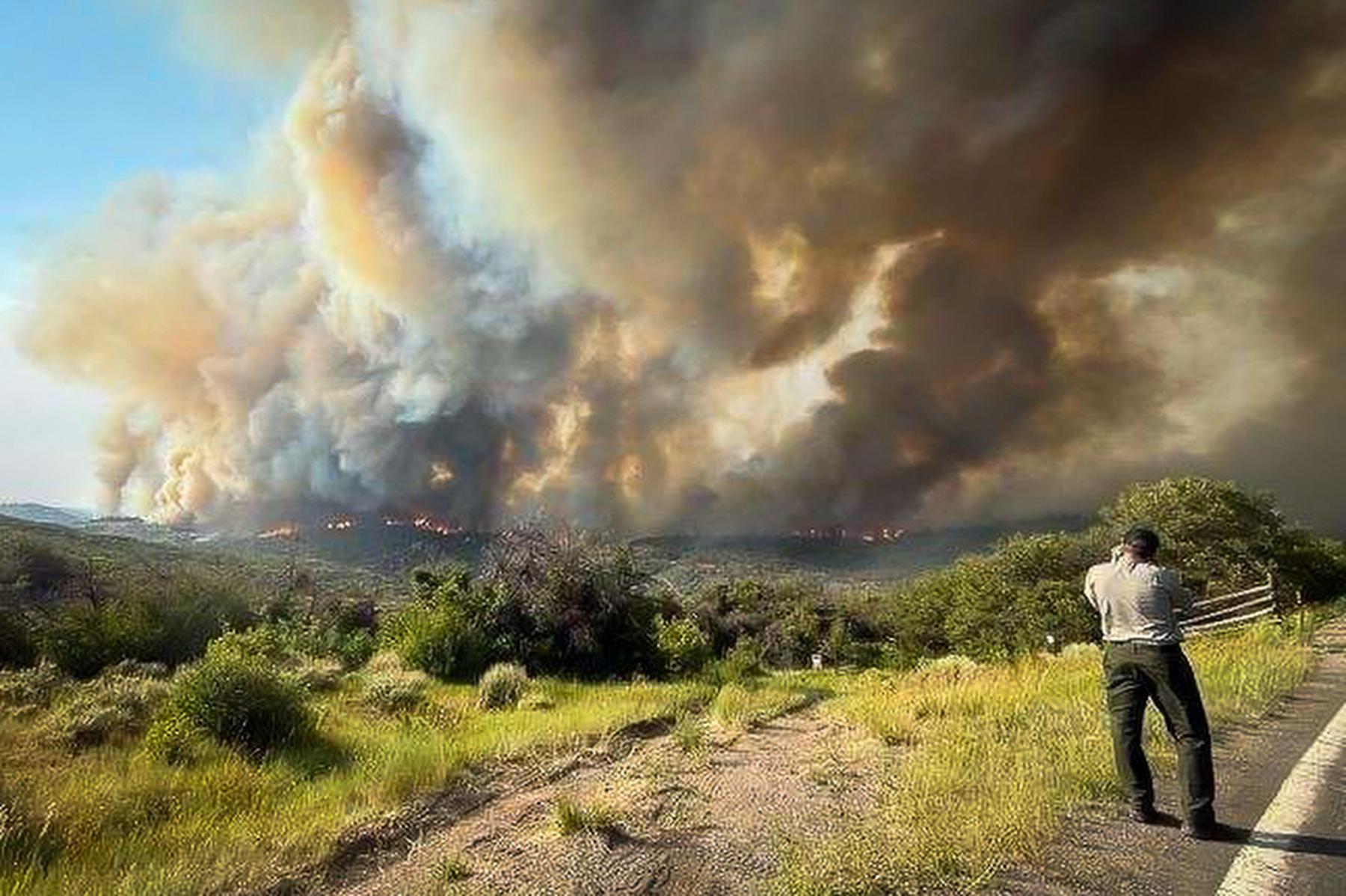 Smoke rises from the South Rim fire at Black Canyon National Park