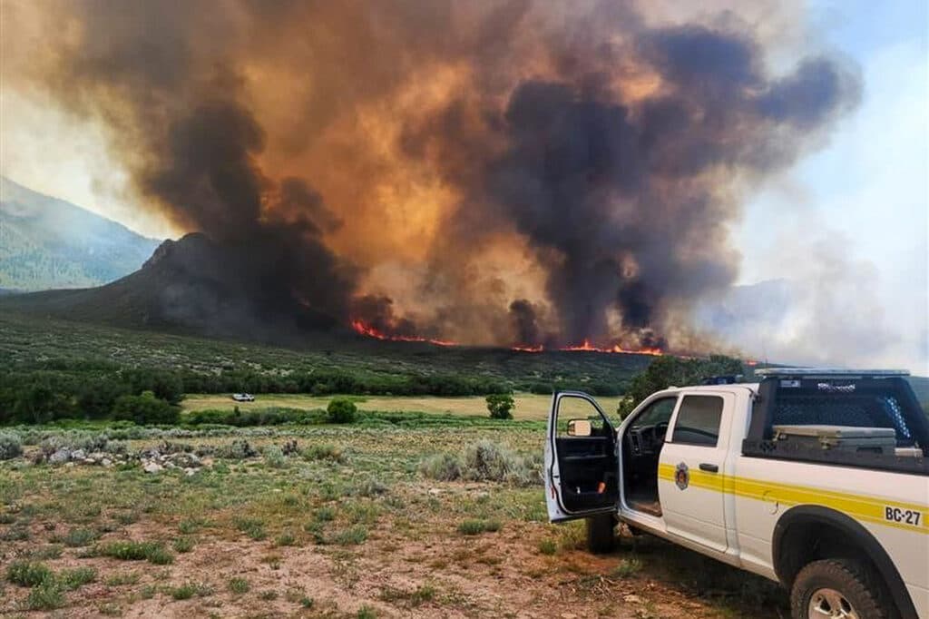 Smoke and flames pour from the Turner Gulch Fire