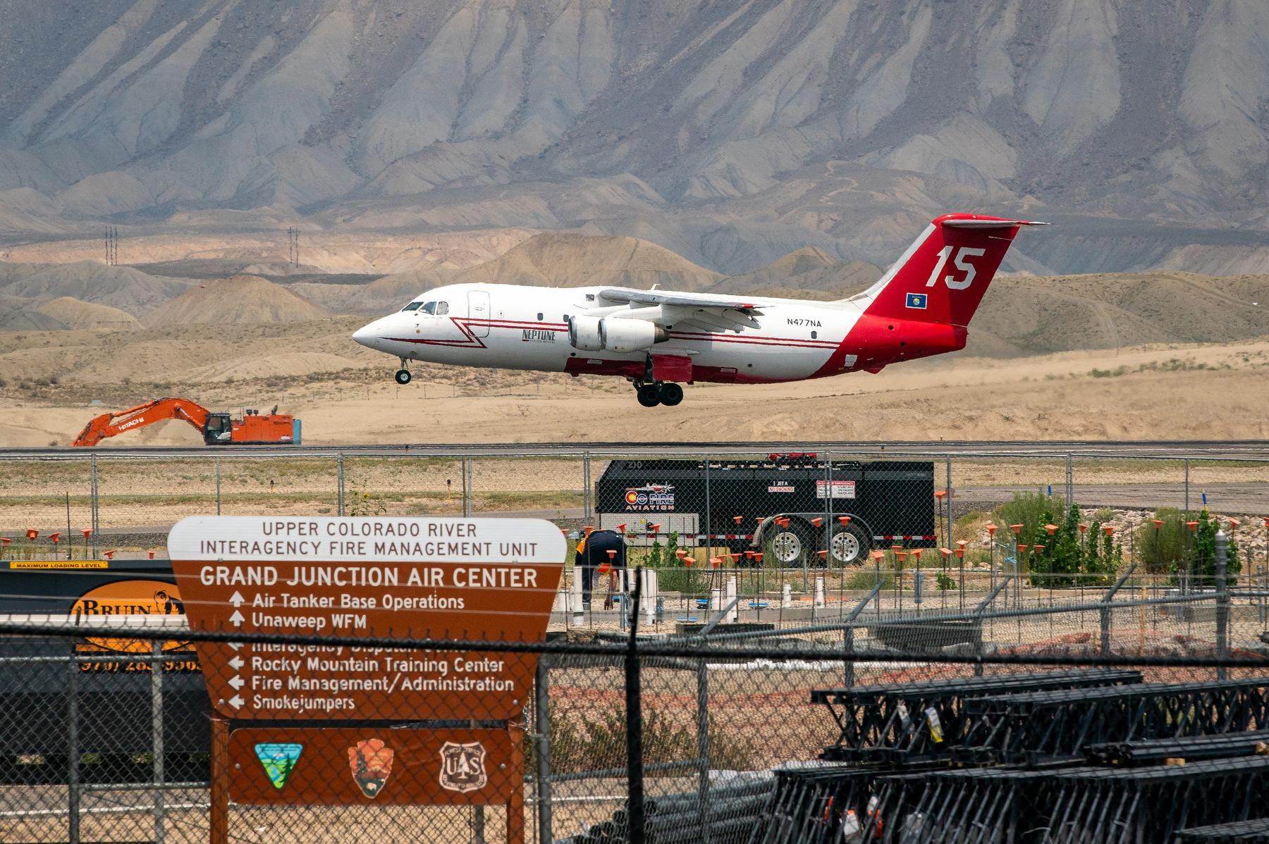 Wildfire fighting aircraft take off from Grand Junction