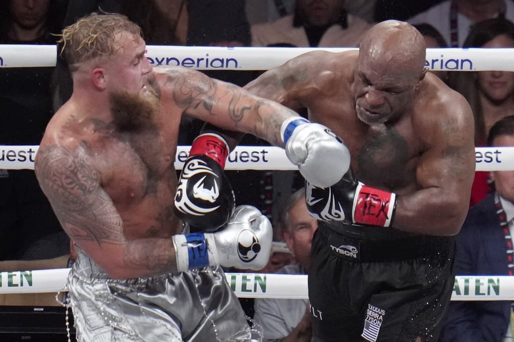 Two men in a boxing ring fighting