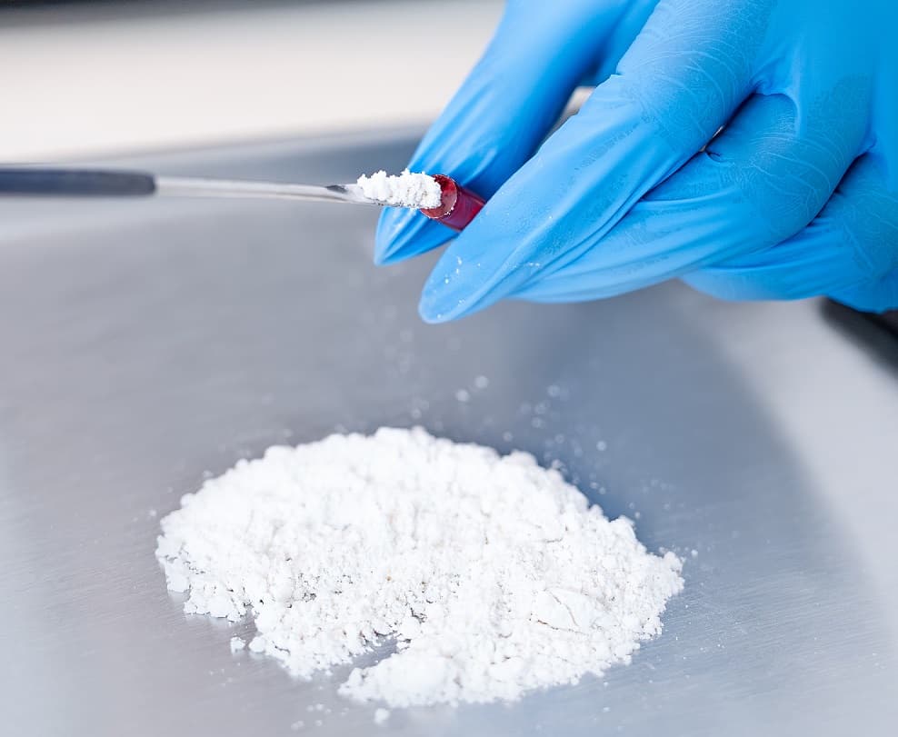 Ibogaine powder bing put into capsule