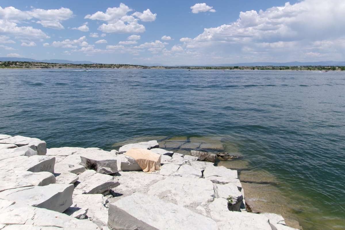Gray rocks looking out onto Lake Pueblo