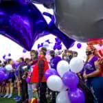 Davarie Armstrong's family and friends fill South High School's football field to mourn his sudden death. July 14, 2020.