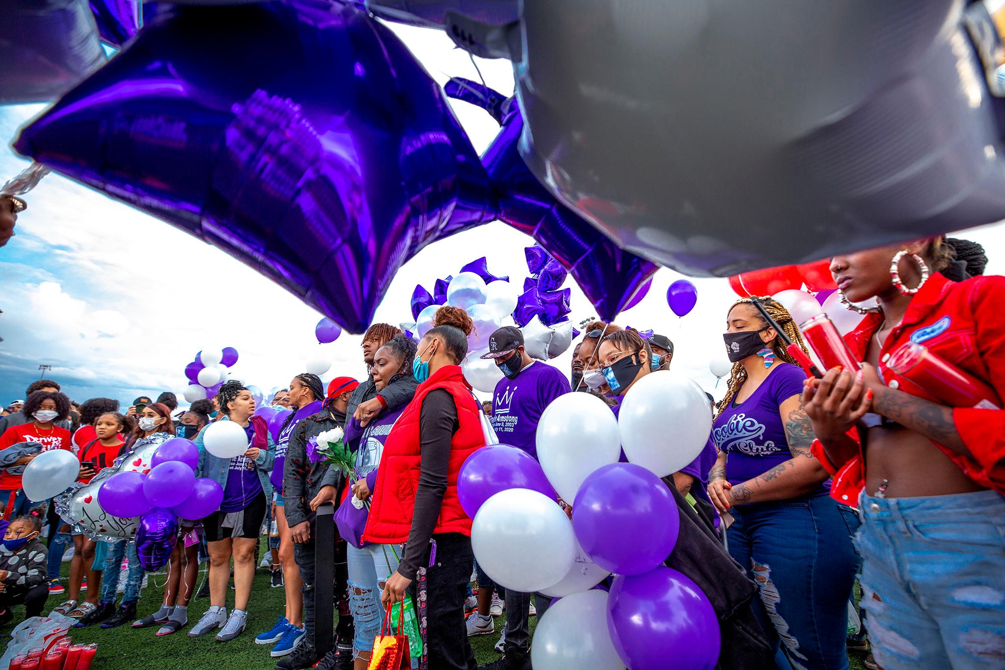 Davarie Armstrong's family and friends fill South High School's football field to mourn his sudden death. July 14, 2020.
