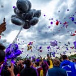 South High School's football field is filled with people who've come to mourn the death of Davarie Armstrong. July 14, 2020.