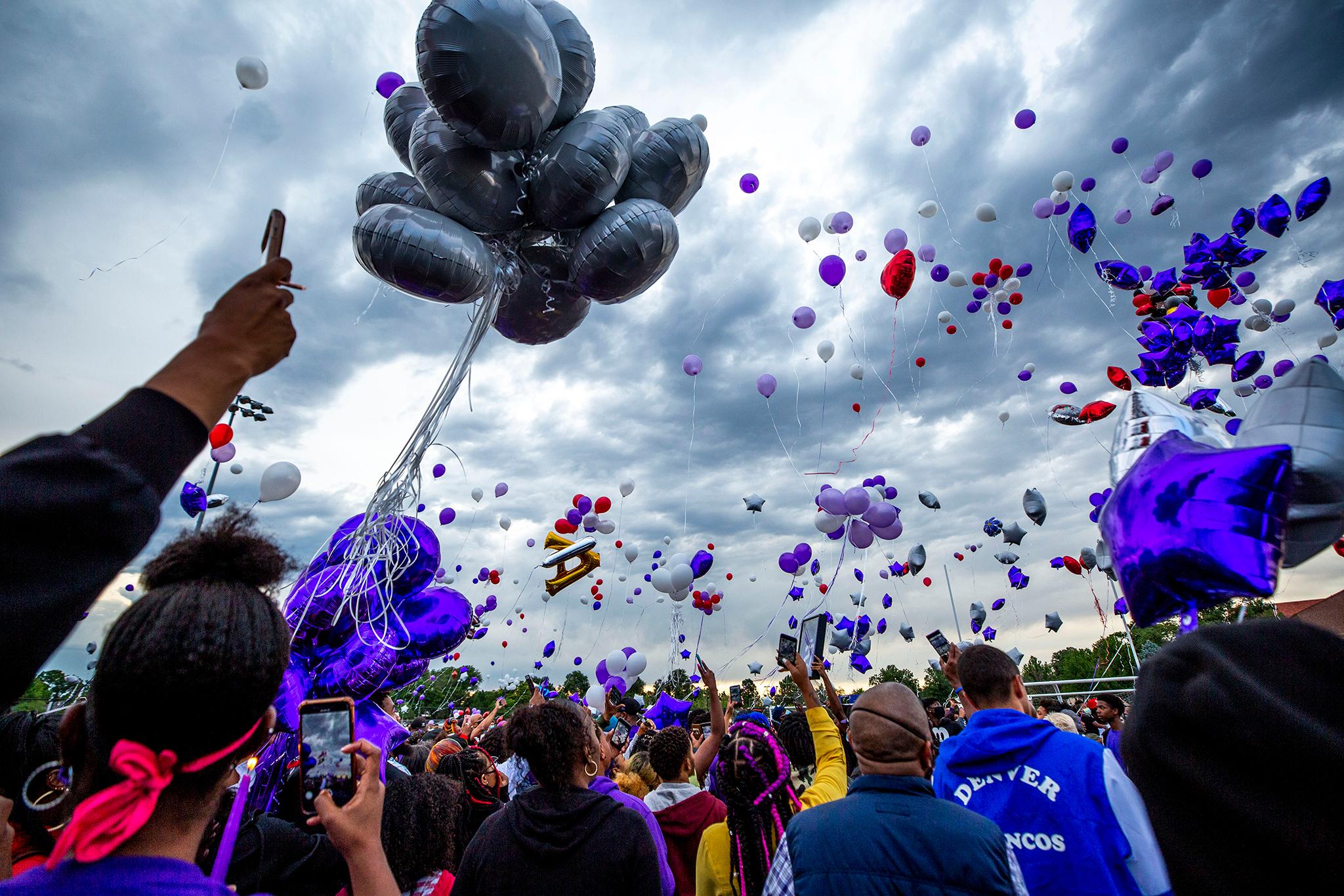 South High School's football field is filled with people who've come to mourn the death of Davarie Armstrong. July 14, 2020.