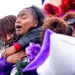 South High School's football field is filled with people who've come to mourn the death of Davarie Armstrong. July 14, 2020.