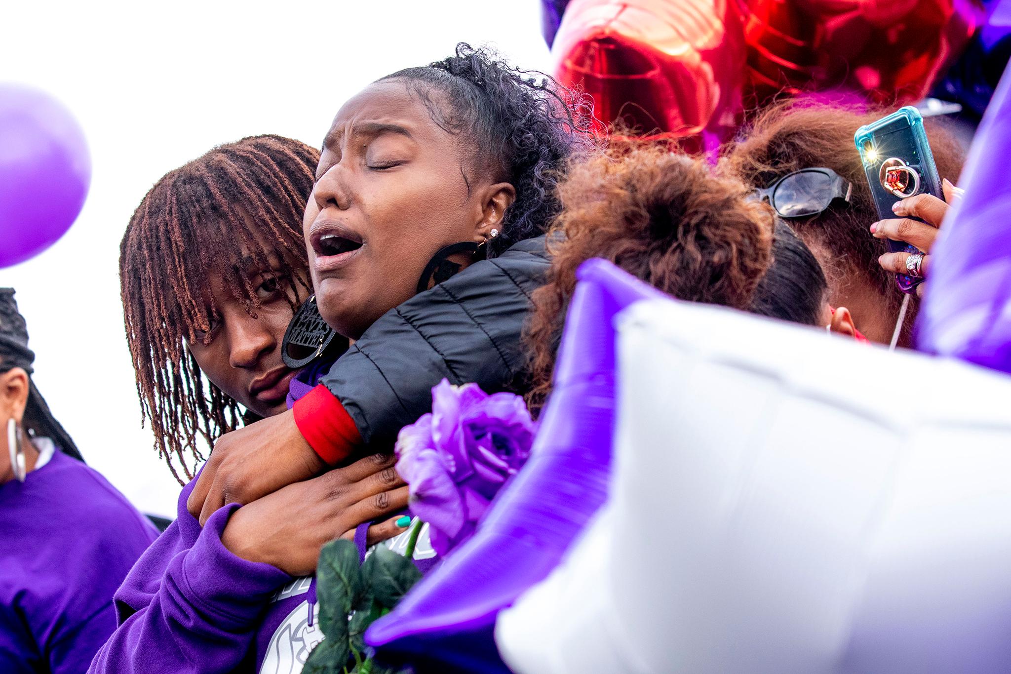 South High School's football field is filled with people who've come to mourn the death of Davarie Armstrong. July 14, 2020.