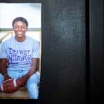 A portrait of Davarie Armstrong inside South High School, where he played football. Aug. 8, 2024.