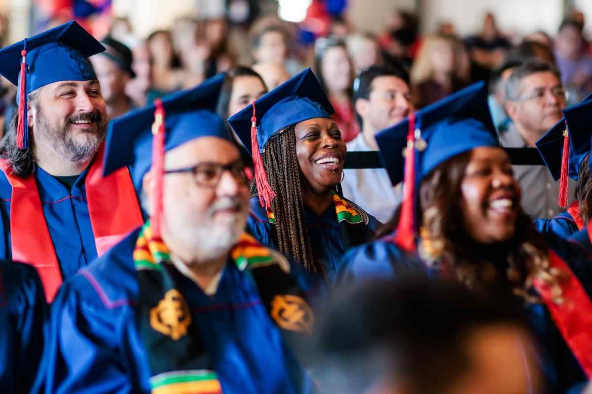 A group of graduates with blue