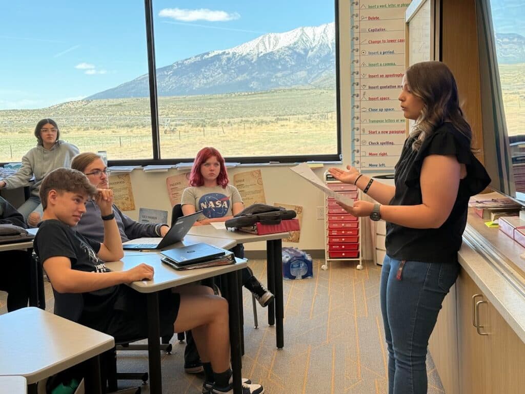 A teacher teaches a lesson.