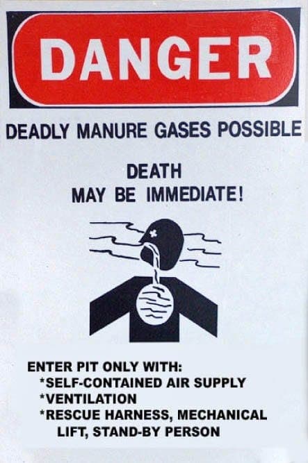 a manure pit warning sign