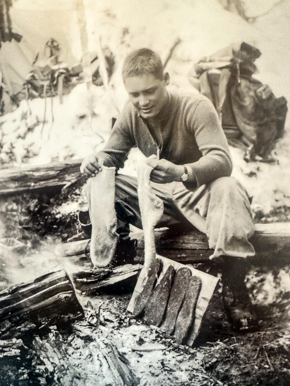 Hugh Evans washes his socks while deployed in Italy in 1945.