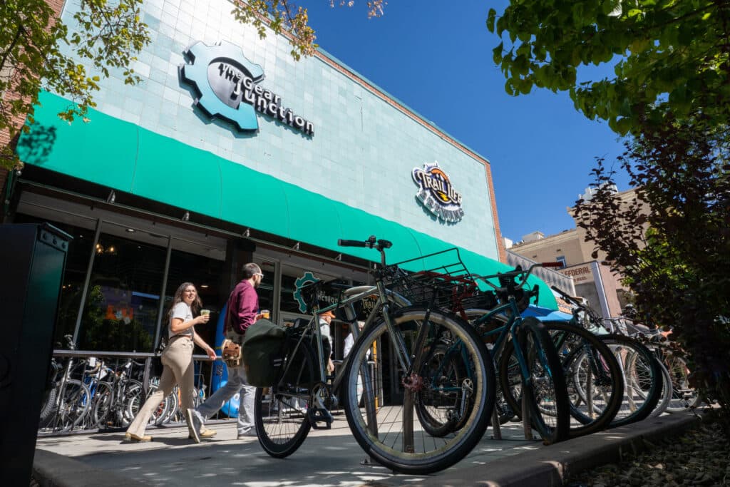 Pedestrians and bikes along Main Street in Grand Junction