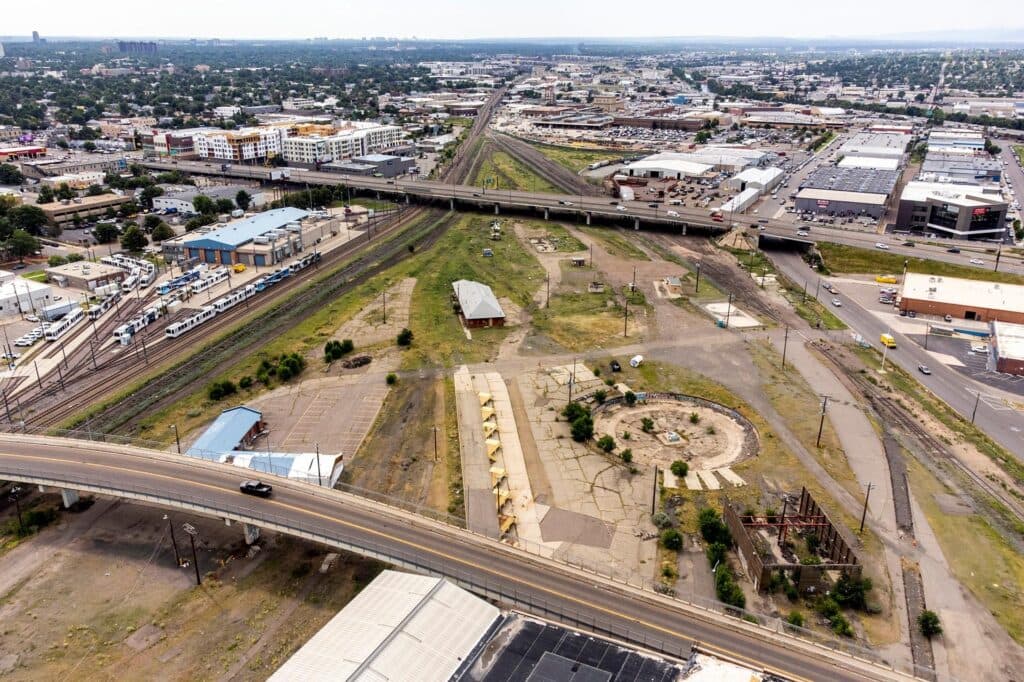 Aerial view of grass fields with multiple overpasses crossing over it