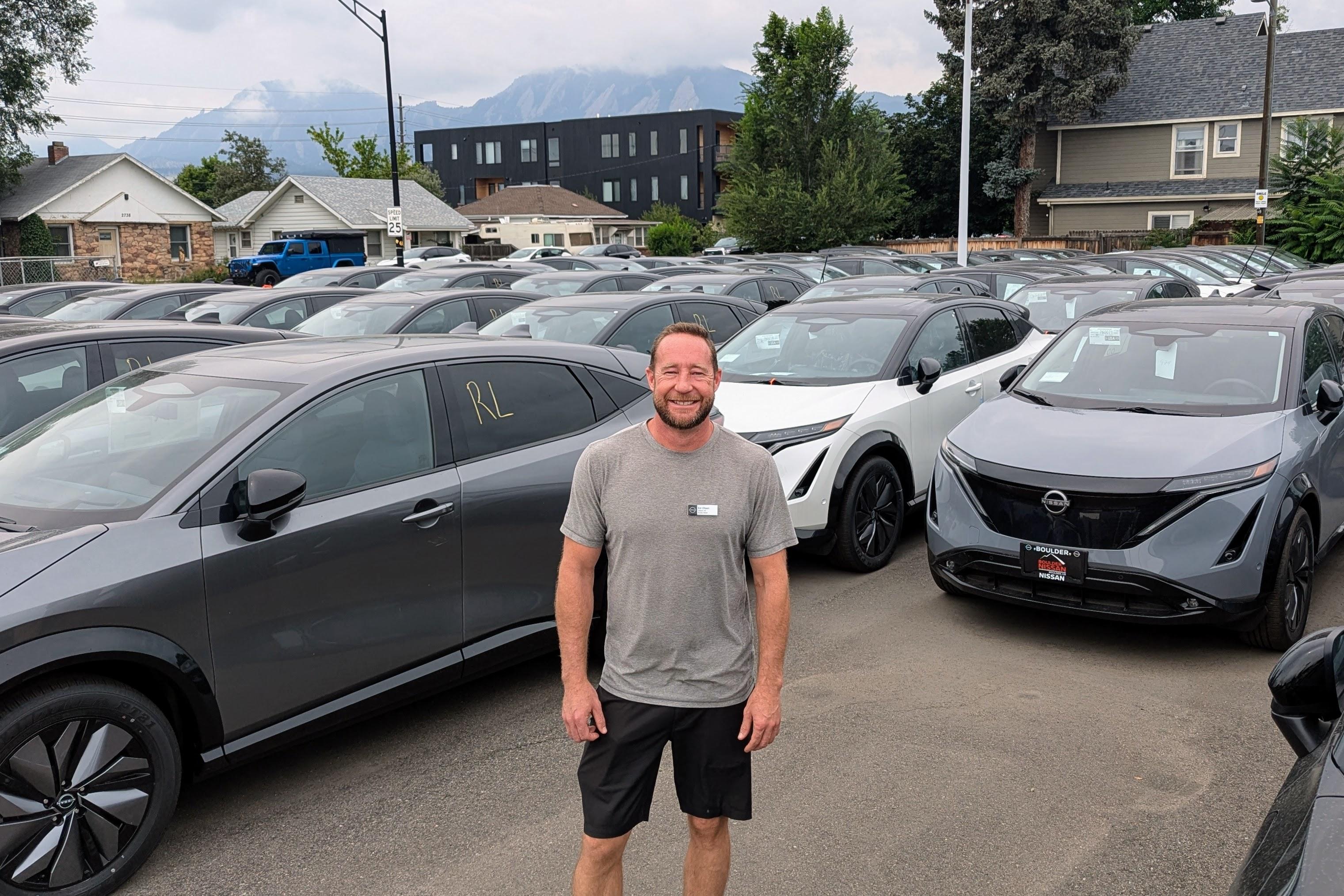 A car dealer in Boulder with a lot packed with all-electric Nissan Ariyas